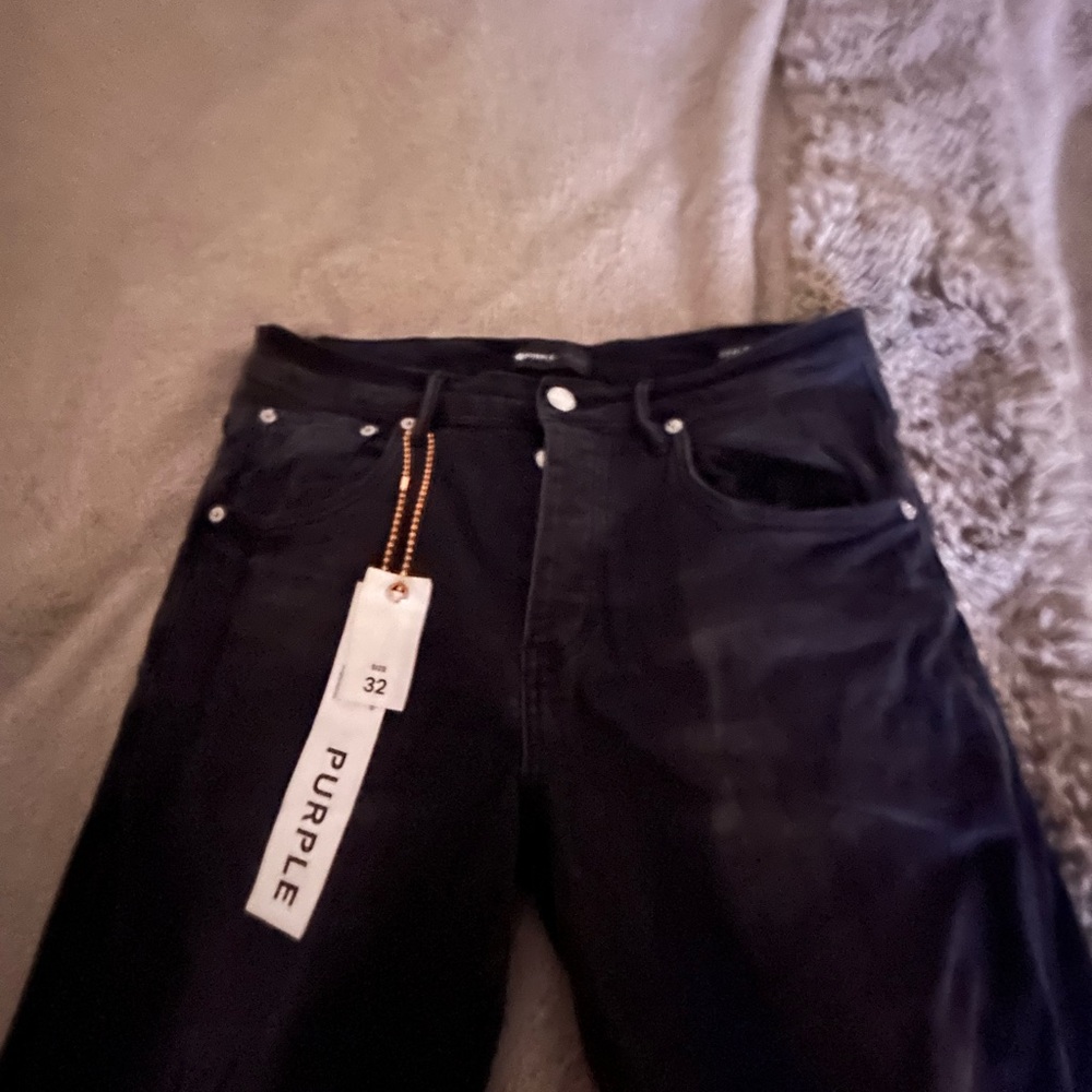 Ripped purple jeans